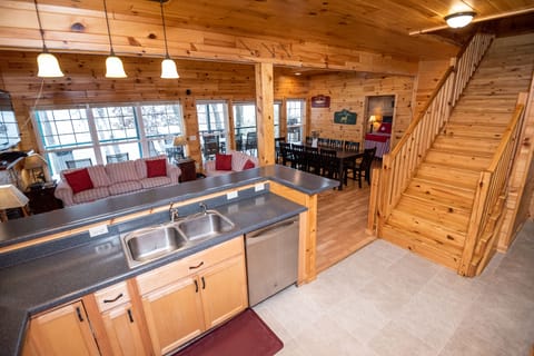 Kitchen opens to the great room and deck, with wonderful views of Stone Lake.