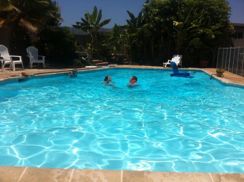 Large pool with 9 ft deep end