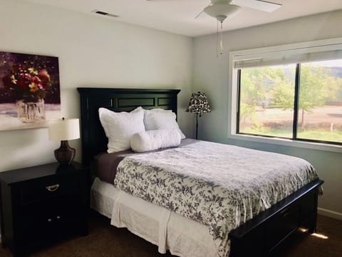 Second bedroom with Queen bed and double closet. Views of the lake channel.