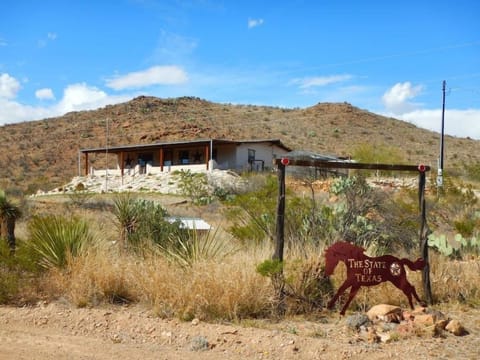 Front View of Property with Property Sign