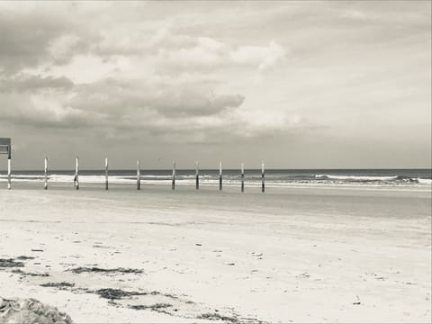 On the beach, sun loungers, beach towels