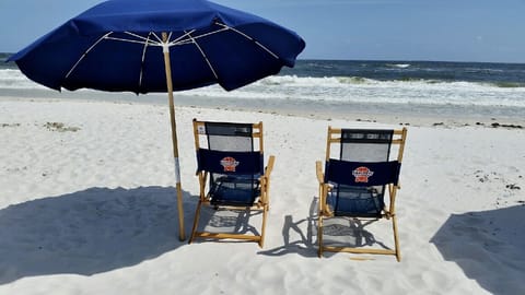 On the beach, sun loungers