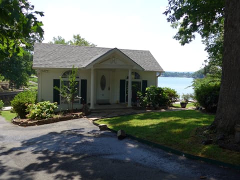 Beautiful lake cottage with deck extending over the water.  No stairs to climb