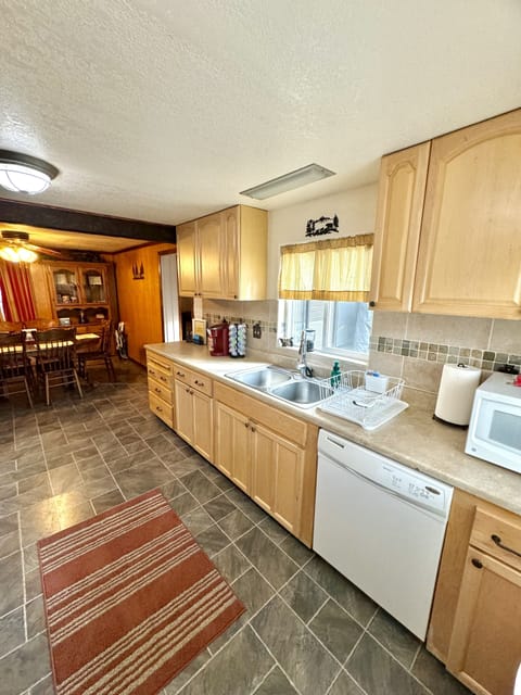 Kitchen with Attached Dining Area that Seats 6