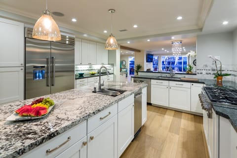 Delight in cooking with professional grade appliances and inspiring water views.