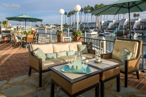 Patio features chat set seating for six, BBQ and dining table for six.