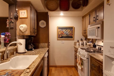 Kitchen with Granite Counter - tops & Bamboo Wood Flooring