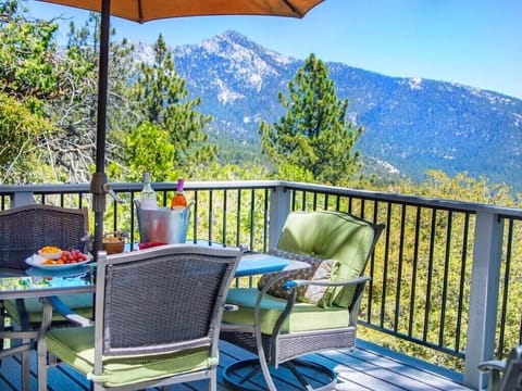 “Unwind outdoors: comfy seating, crisp mountain air, and panoramic views.”
