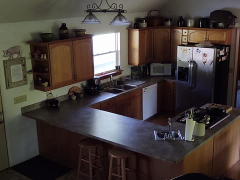 Prepare your breakfast with farm fresh offerings in fully equipped open kitchen.