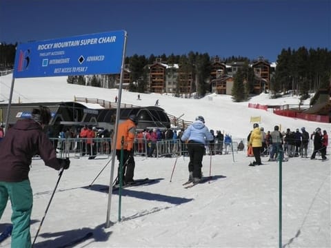 Skiwatch condo in background with Colorado and Rocky Mountain Super chairs.