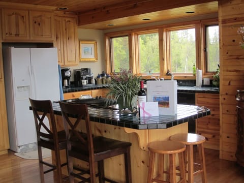 Spacious, bright kitchen with Jen Air cook top, double ovens.