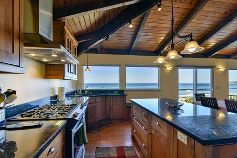 The kitchen has granite countertops, lots of space to move around and great view