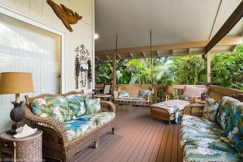 Welcome to Paradise! This home boasts 2500 sf of comfortable living space and is just across the street from the ocean! The large lanai is surrounded by tropical plants with an outdoor dining area and plenty of lounge seating for the whole family!