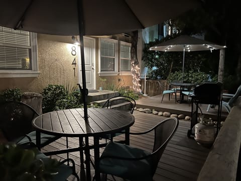 Front of house showing entrance to other cottage unit.  Left patio side is yours