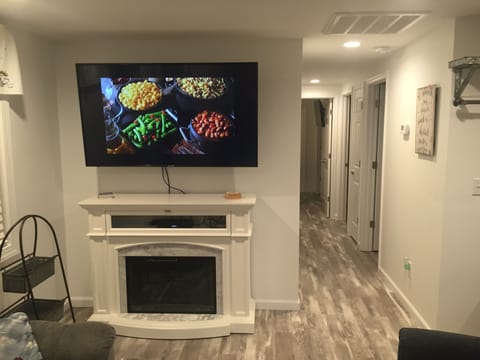 60" tv in living room with HD cable