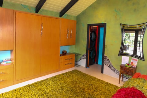 Windmill house living room and area where Queen Murphy bed pulls down.