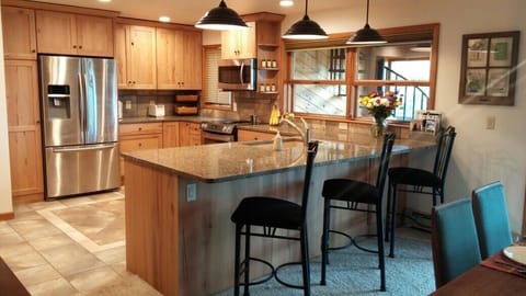 Newly remodeled kitchen with breakfast bar seating