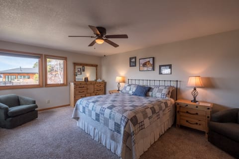 Mid-level master bedroom with great views and private door to deck.