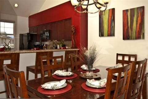 Fully furnished gourmet kitchen w/granite and 3 person bar, plus 6 person dining