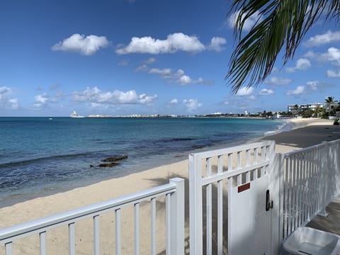 On the beach, sun loungers, beach towels