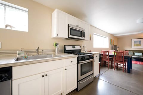 Gas range with 4 burners, dishwasher, microwave, coffee maker, coffee provided.