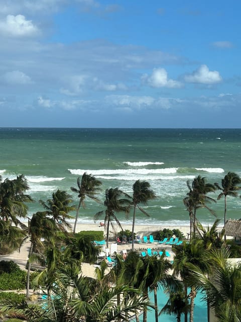 On the beach, sun loungers, beach towels