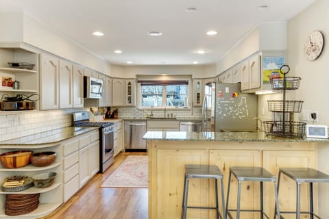Huge kitchen, two dishwashers, two microwaves, two sinks, multiple prep areas