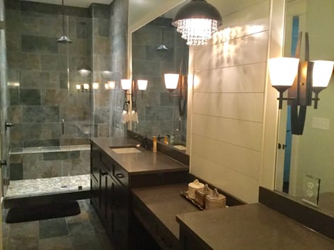 Large master bathroom with double vanity and custom tile shower!