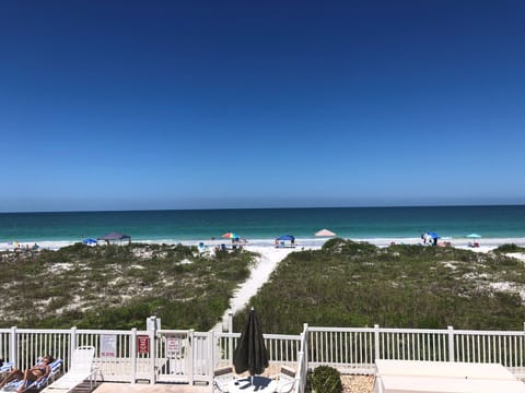 On the beach, sun loungers, beach towels