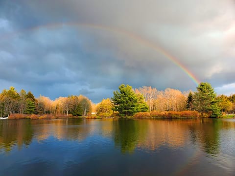 Rainbow over Lake Naomi. Photo taken by a short term rental tenant.