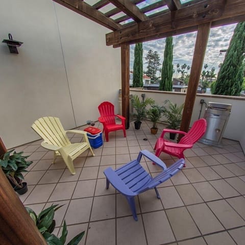 Chat, eat, and drink on the community patio which is close to our condo.