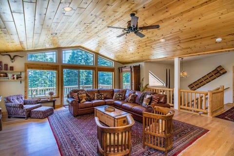 Great Room on top floor, front deck, steps leading to bottom floor