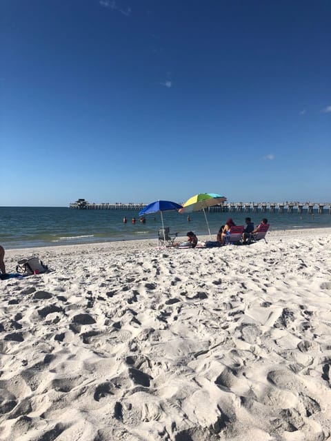 Beach nearby, beach umbrellas, beach towels