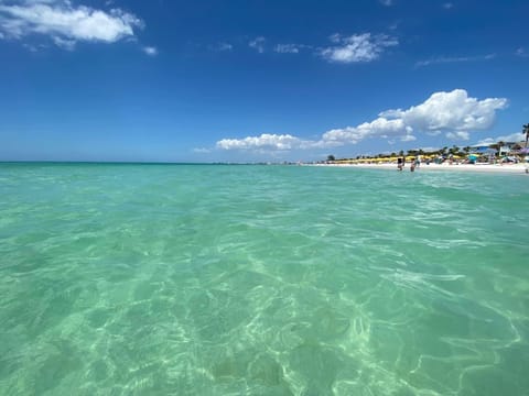 On the beach, sun loungers, beach towels