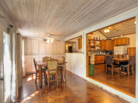 Sunroom table with 6 chairs.