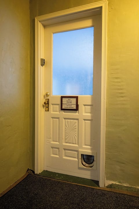 Door to the apartment.  Key box is mounted next to the door. 