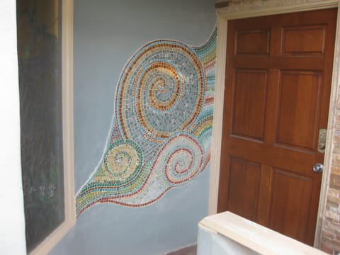 Custom mosaic at entry
