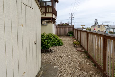 Side yard with new fencing.