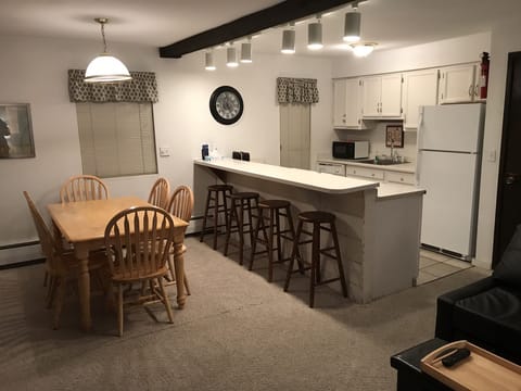 Dining Area & bar for entertaining, and the window looks out towards mountains
