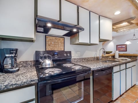 View of kitchen with new appliances and granite counter tops