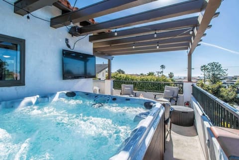 Picture yourself with your friends or family relaxing in this huge 120-jet PRIVATE jacuzzi overlooking the beautiful pacific ocean.  Watch TV from the Jacuzzi as well or enjoy the overhead string lights for ambiance at night.