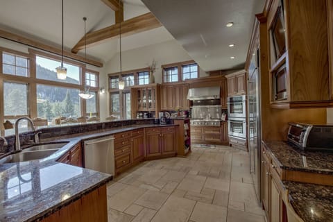 Kitchen, cook top with 6 burners, griddle & warming rack, 2 dishwashers