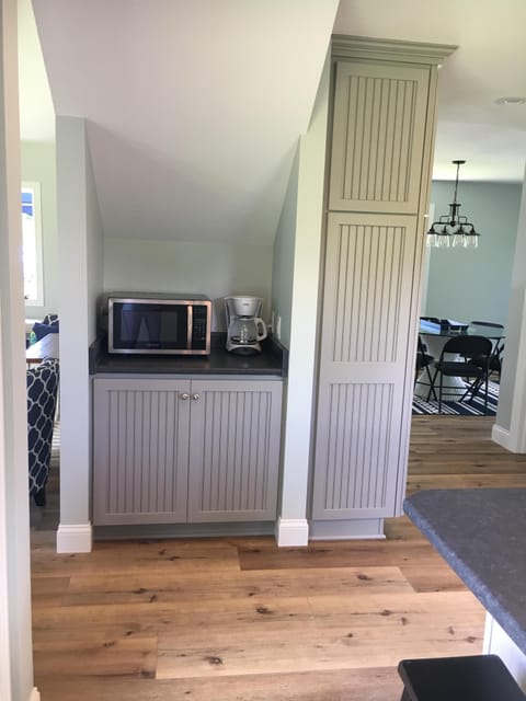 Coffee bar and microwave.