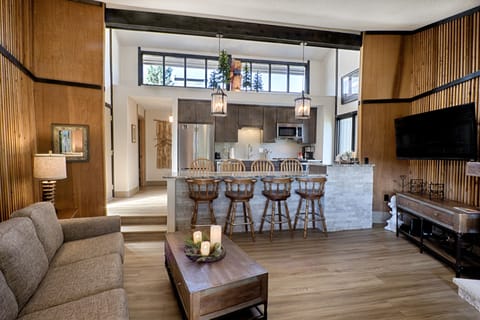 The Cathedral ceiling gives spacious ambiance to living-dining room and kitchen.