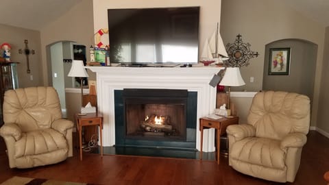 Living Room with Gas Fireplace and 65" TV