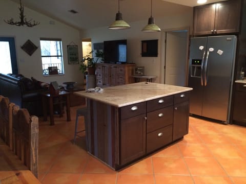 Large island in the kitchen is a great gathering place for friends & family.
