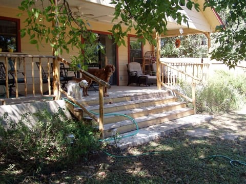 A large and spacious back porch for dining, reading, or just being. 