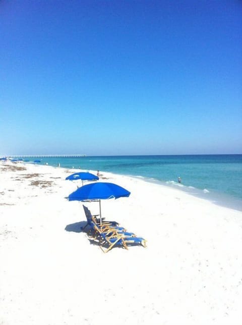 On the beach, sun loungers, beach towels