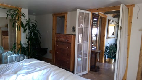 Brockway Lakeview Cabin - 
Master bedroom vintage doors facing living room