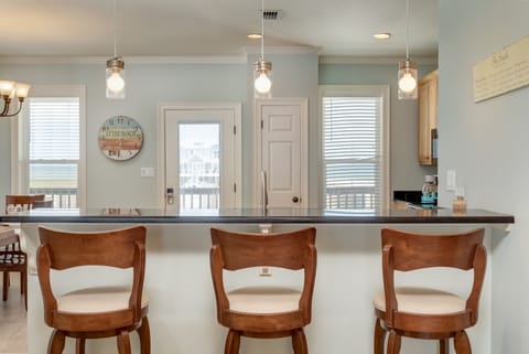 Hang out with the cook at the kitchen Island